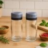 01_91927a7b-fa5a-41c1-80ce-6514fc9bc08f Salt and Pepper Shaker Set – Transparent Acrylic & Durable Design