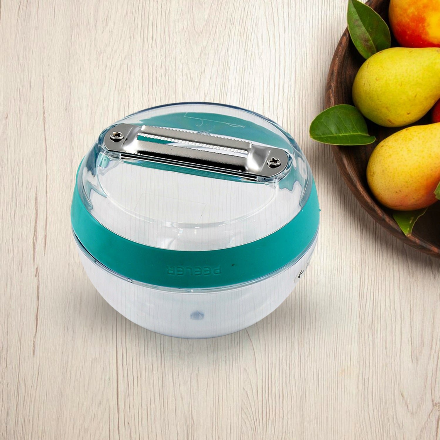 01_c03cbc1f-6075-4ab3-9f57-23b06ec0b5dc Multifunctional Round Peeler – Peel-Catching & Ergonomic | Quickslice