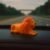 Lion Car Dashboard Toy – Majestic Orange-Gold Ornament with Adhesive Base