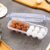 Egg Storage Box – 12-Grid Airtight Refrigerator Organizer
