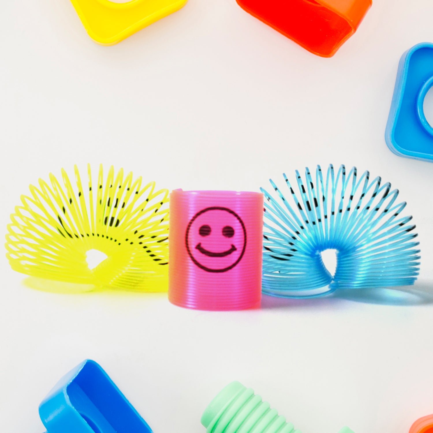 04_ad8278cc-f63e-4d5f-aadf-b9579d1311a9 Slinky Spring Toy – Multicolor Fun Pack (12 Pcs) | Little Learners