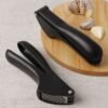 Garlic Press – Effortless Manual Garlic Crushing Tool