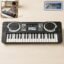 Electronic Musical Keyboard Toy – Multiple Sounds & Rhythms for Kids