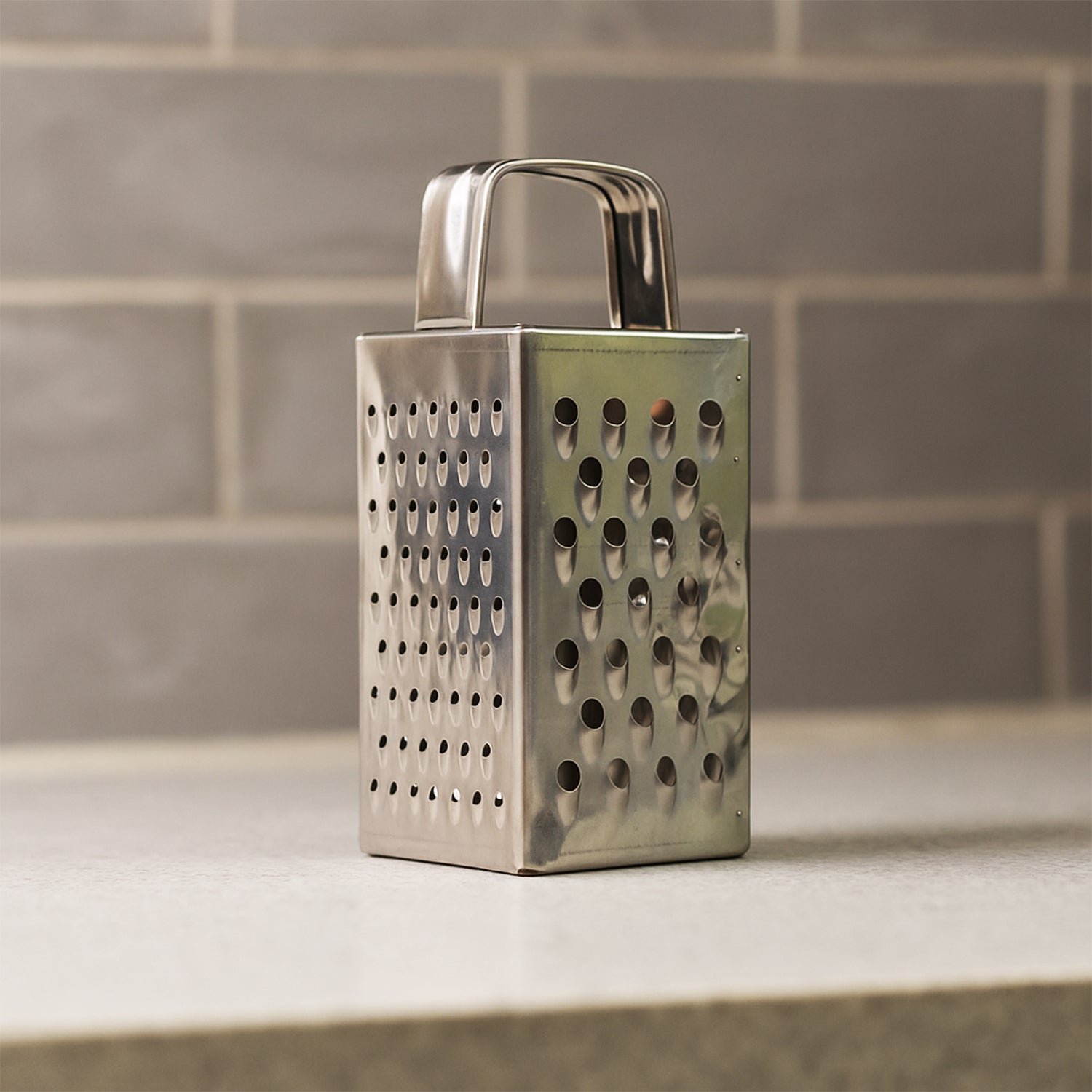 Stainless Steel 4-in-1 Compact Grater & Slicer – Durable Kitchen Tool