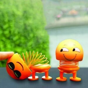 Shaking Head Doll – Smiling Emoticon Figure | Dollovia