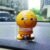 Shaking Head Doll – Smiling Emoticon Figure | Dollovia