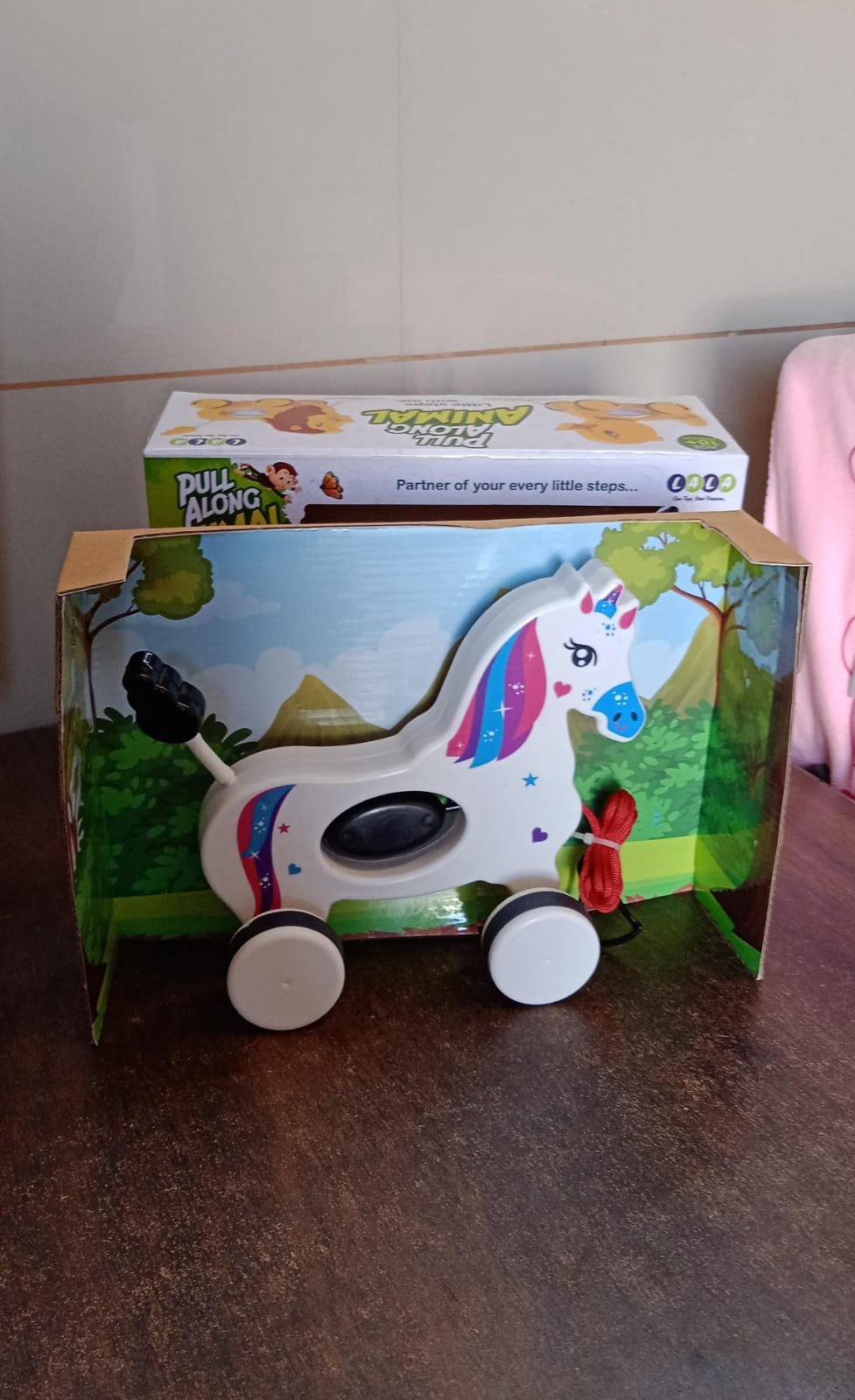 5bee6744-1a8b-4f50-bcb4-564310ff67f2 Unicorn Pull Along Toy – Encourages Toddler Walking & Motor Skills