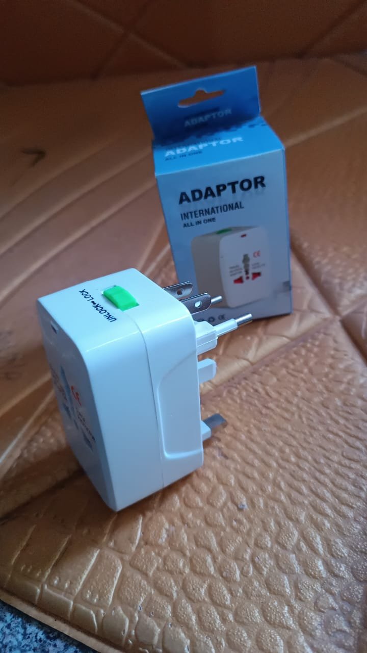 8fdf2b3d-96f6-4c14-be96-e8722b2de79d Universal Travel Adapter – Compact Surge Protection for 150+ Countries