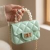 ChainLadiesBags-05_2377edd9-5317-4283-a88c-1f3ac0aa56e5 Quilted Mini Handbag – Elegant Pearl Handle & Chain Strap