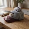 Women's Winter Woolen Baseball Cap – Cozy Pom Pom & Sun Protection