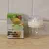 Plastic Mini Manual Citrus Lemon Orange Squeezer with Cup (1 Pc)