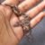 Krishna Flute Keychain – Durable Stainless Steel Spiritual Accessory
