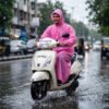 UnisexPinkRaincoat-05.jpg EVA Hooded Long Rain Coat – Monsoon Wear for Men & Women
