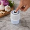 chopper_pressing_button Mini Garlic Chopper – Cordless & Rechargeable for Easy Meal Prep