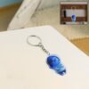 keychain-01_c6389294-ba25-4ec7-ac48-8136d4ab0552 Cartoon Character Acrylic Keychain – Durable & Vibrant Design